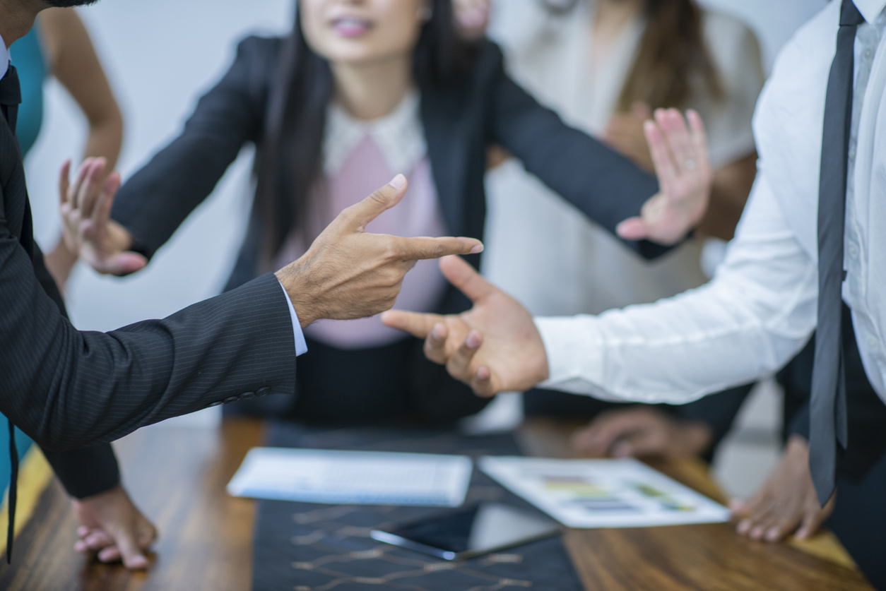 Asian women mediating disagreement