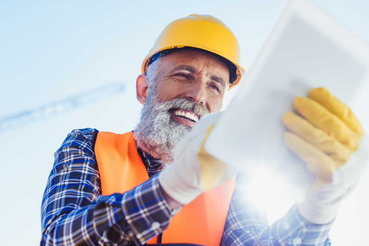 construction worker using digital tablet